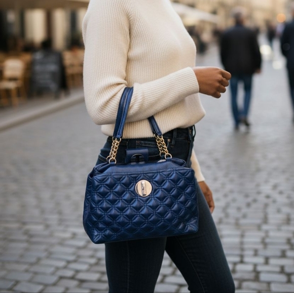 kate spade Handbags - Quilted large Kate Spade navy leather bag with gold chain and leather straps.